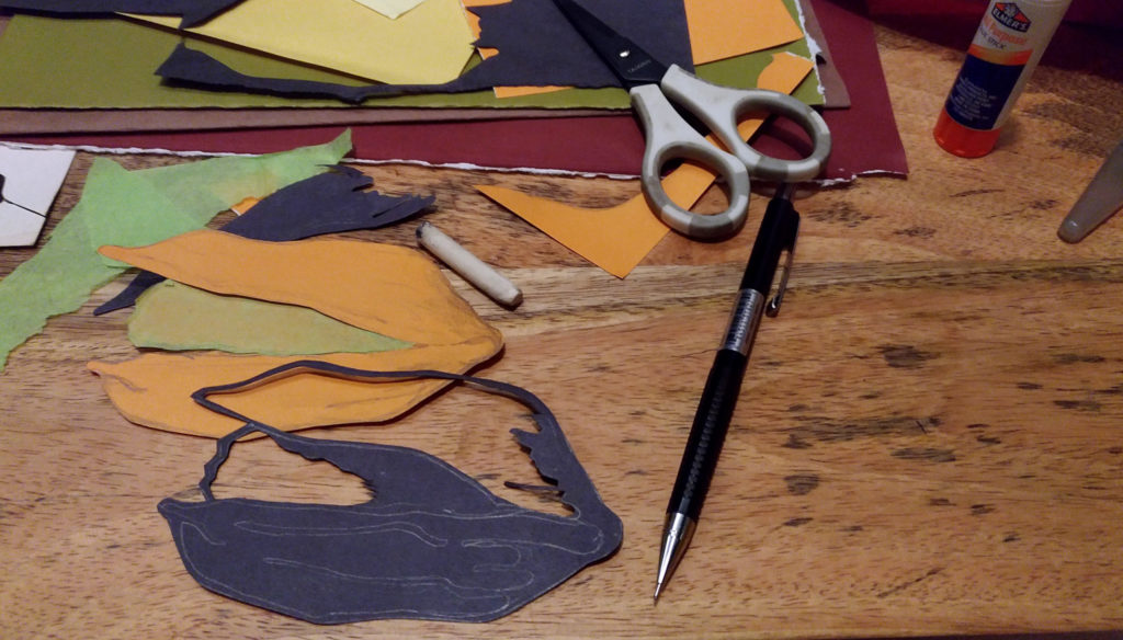 Cutting the pistachio shell from orange paper