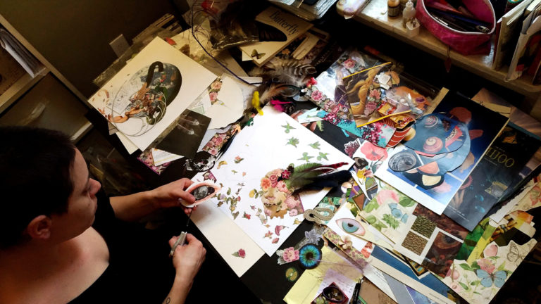 Sorting through a pile of paper scraps